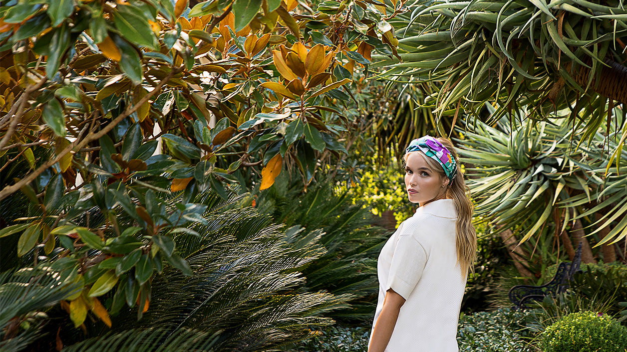 Woman_in_garden_wearing_turban_waterproof_headband_abstract_floral_print_desktop