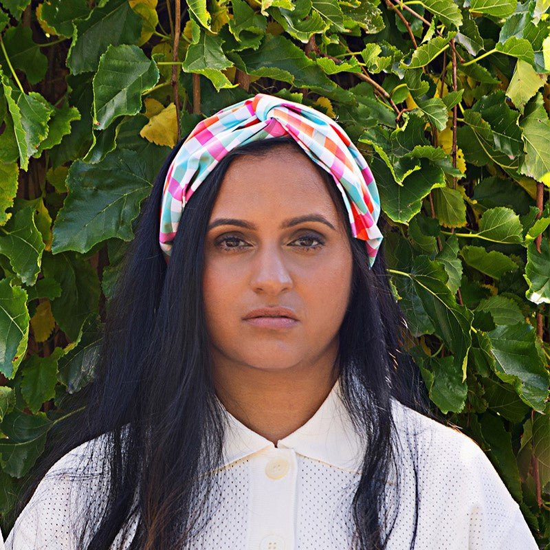 Woman_in_garden_wearing_turban_waterproof_headband_gingham_print_square